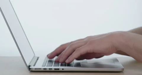 Man hand working on a notebook using touchpad Stock Footage 130348243