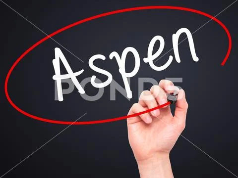 Man Hand writing Aspen with black marker on visual screen Stock Photos