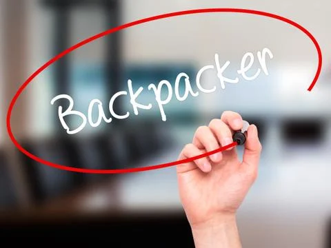 Man Hand writing Backpacker with black marker on visual screen. Stock Photos