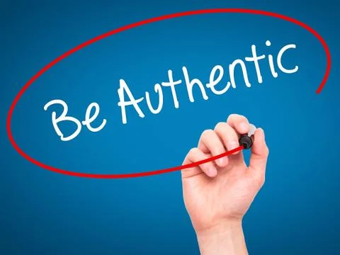 Man Hand writing Be Authentic with black marker on visual screen Stock Photos