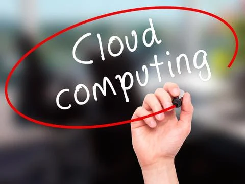 Man Hand writing Cloud computing with black marker on visual scr Foto stock
