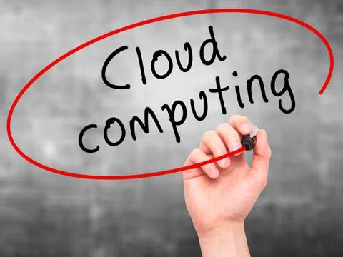 Man Hand writing Cloud computing with black marker on visual scr Foto stock