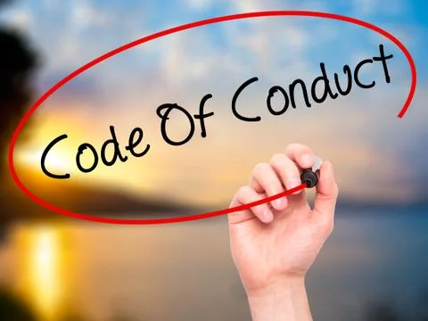 Man Hand writing Code Of Conduct with black marker on visual screen Foto stock