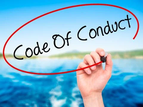 Man Hand writing Code Of Conduct with black marker on visual screen Foto stock
