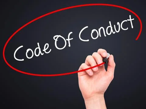 Man Hand writing Code Of Conduct with black marker on visual screen Stock Photos