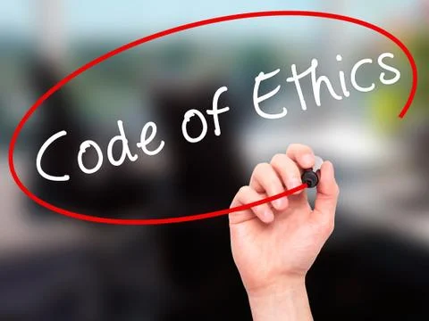 Man Hand writing Code of Ethics with black marker on visual screen Stock Photos