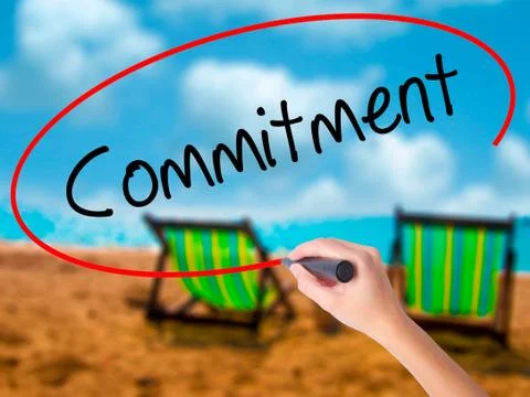Man Hand writing Commitment with black marker on visual screen. Stock Photos