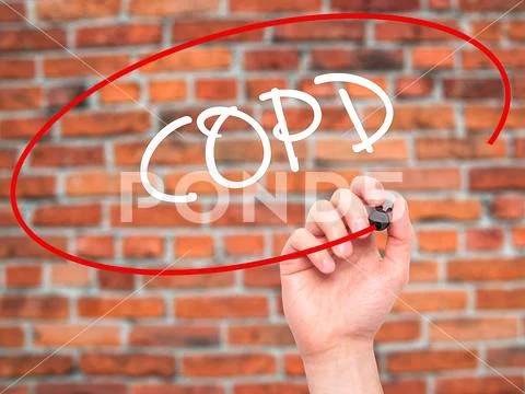 Man Hand writing COPD with black marker on visual screen Stock Photos