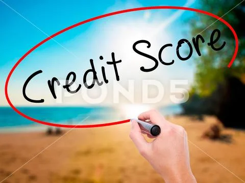 Man Hand writing Credit Score black marker on visual screen Stock Photos