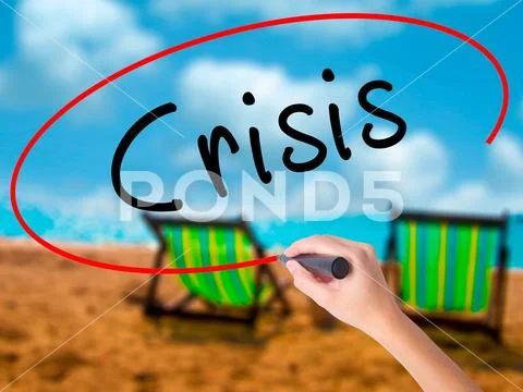 Man Hand writing Crisis with black marker on visual screen Stock Photos