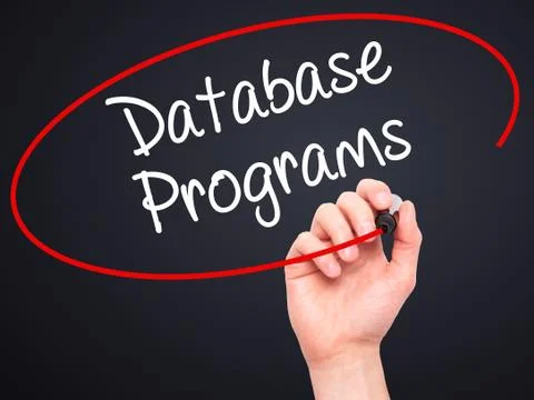 Man Hand writing Database Programs with black marker on visual screen. Stockfoto's