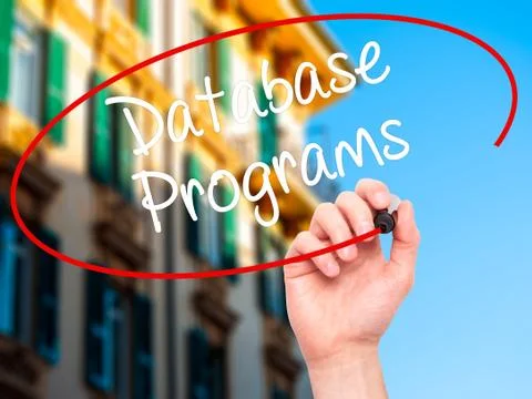 Man Hand writing Database Programs with black marker on visual screen. Stockfoto's