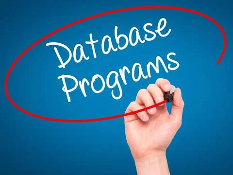 Man Hand writing Database Programs with black marker on visual screen. Foto stock