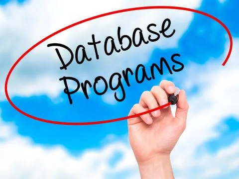 Man Hand writing Database Programs with black marker on visual screen. Foto stock