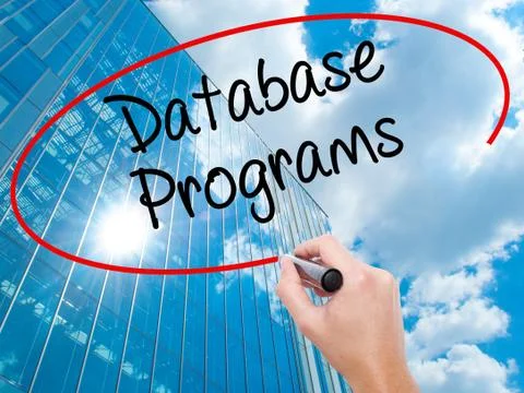 Man Hand writing Database Programs with black marker on visual screen. Foto stock