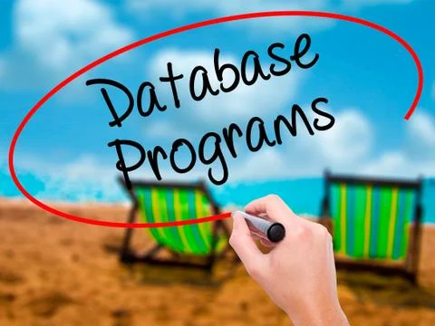 Man Hand writing Database Programs with black marker on visual s Foto stock