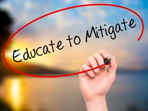 Man Hand writing Educate to Mitigate with black marker on visual screen Stock Photos
