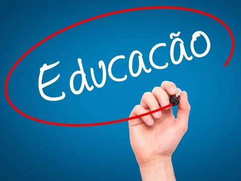 Man Hand writing Education (Educacao in Portuguese) with black marker on visu Stock Photos