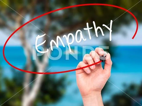 Man Hand writing Empathy with black marker on visual screen Stock Photos