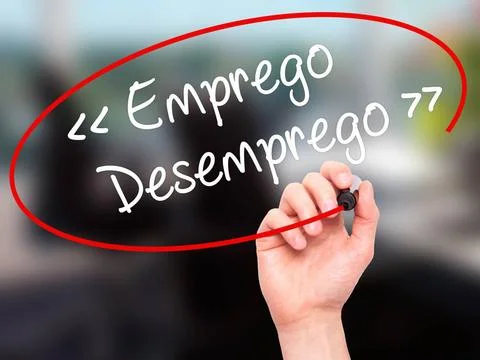 Man Hand writing Emprego Desemprego (Employment - Unemployment in Portugue... Stock Photos