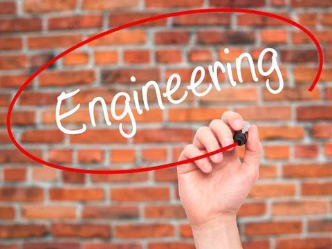 Man Hand writing Engineering  with black marker on visual screen Foto stock