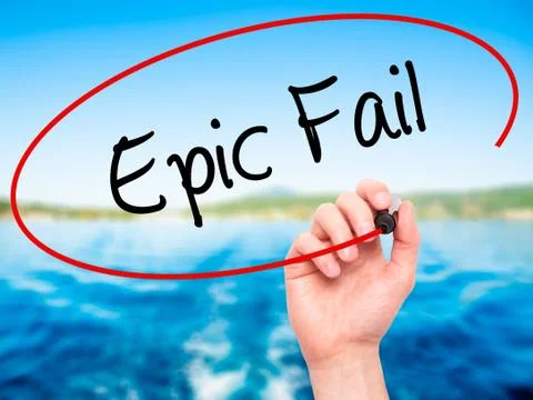 Man Hand writing Epic Fail with black marker on visual screen Foto stock