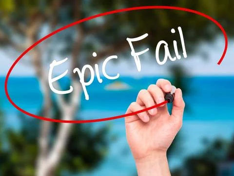 Man Hand writing Epic Fail with black marker on visual screen Stock Photos