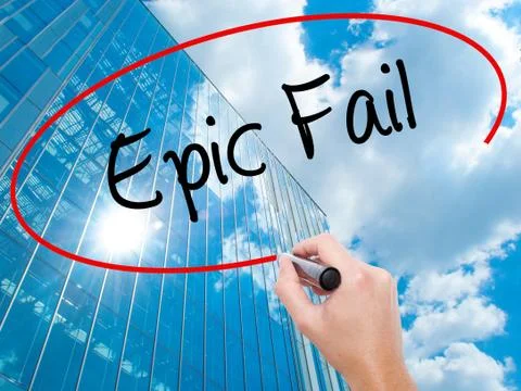Man Hand writing Epic Fail with black marker on visual screen Foto stock