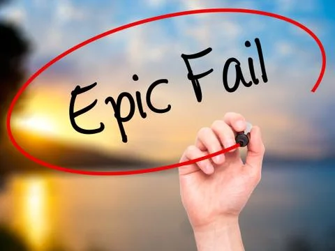 Man Hand writing Epic Fail with black marker on visual screen Foto stock