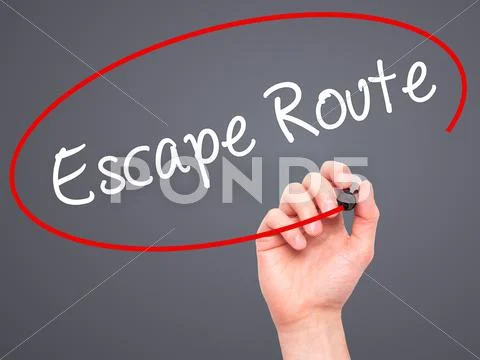 Man Hand writing Escape Route with black marker on visual screen ...