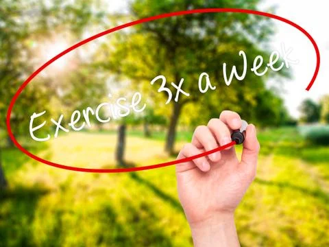 Man Hand writing Exercise 3x a Week with black marker on visual screen. Stock Illustration