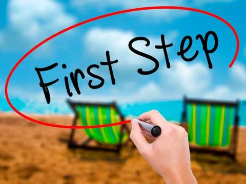 Man Hand writing First Step  with black marker on visual screen Stock Photos