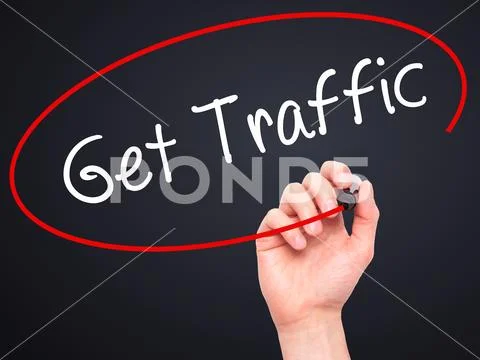 Man Hand writing Get Traffic with black marker on visual screen Stock Photos