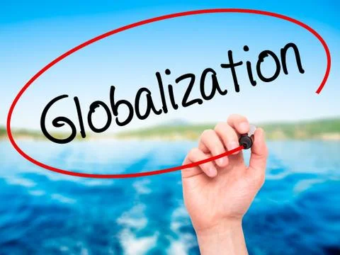 Man Hand writing Globalization with black marker on visual screen. Stock Photos