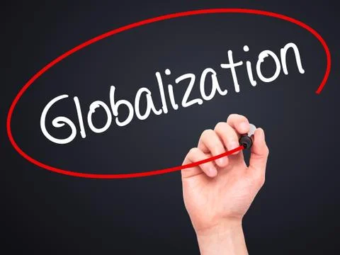 Man Hand writing Globalization with black marker on visual screen. Stock Photos
