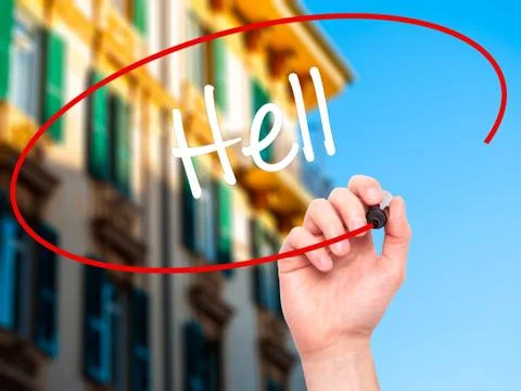 Man Hand writing Hell with black marker on visual screen. Stock Photos