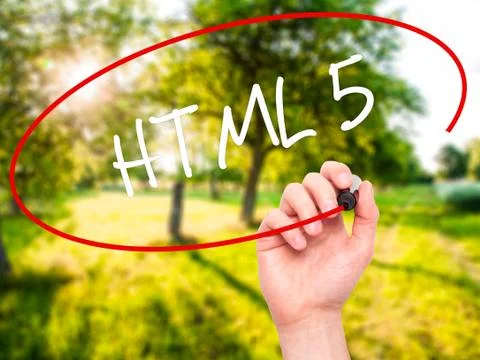 Man Hand writing HTML 5 with black marker on visual screen Stock-Fotos