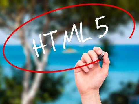 Man Hand writing HTML 5 with black marker on visual screen Stock-Fotos