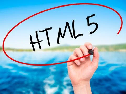 Man Hand writing HTML 5 with black marker on visual screen Stockfoto's