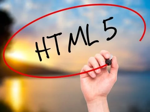 Man Hand writing HTML 5 with black marker on visual screen 库存照片