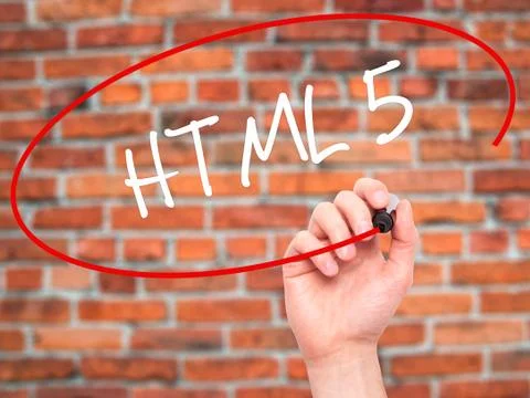 Man Hand writing HTML 5 with black marker on visual screen Stock Photos