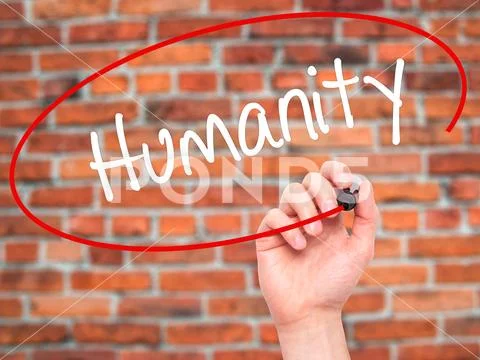 Man Hand writing Humanity with black marker on visual screen Stock Photos