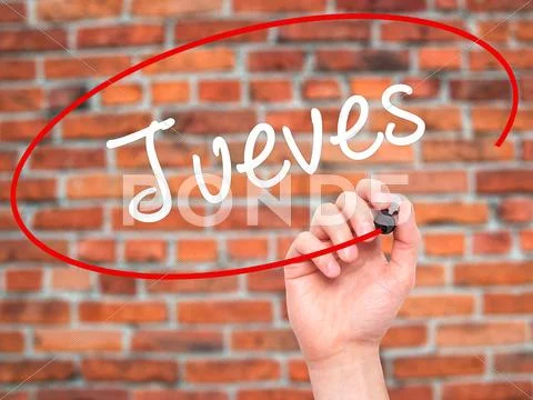 Man Hand writing Jueves (Thursday in Spanish) with black marker on visual screen Stock Illustration