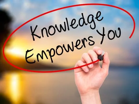 Man Hand writing Knowledge Empowers You with black marker on visual screen Stock Photos