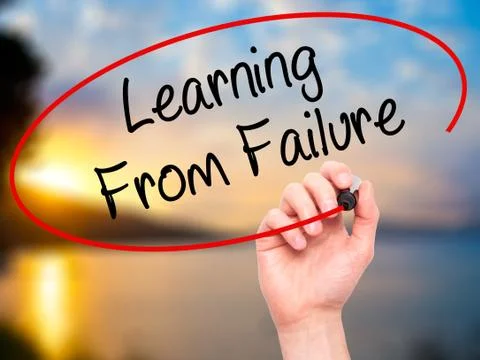 Man Hand writing Learning From Failure with black marker on visual screen. Stock Photos