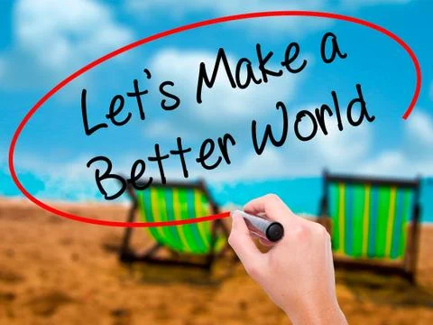 Man Hand writing Let's Make a Better World with black marker on Stock Photos