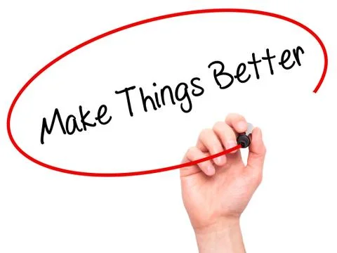 Man Hand writing   Make Things Better with black marker on visual screen Foto stock