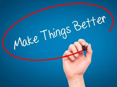 Man Hand writing   Make Things Better with black marker on visual screen Foto stock