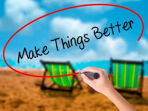 Man Hand writing   Make Things Better with black marker on visua Stock Photos