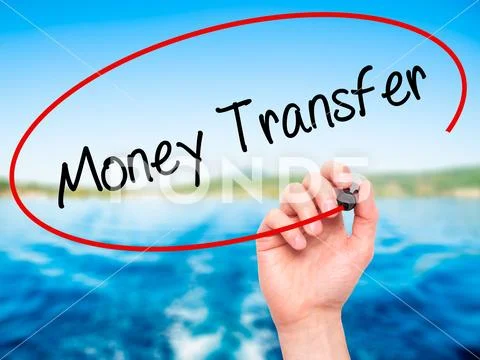 Man Hand writing Money Transfer with black marker on visual scr Stock Photos